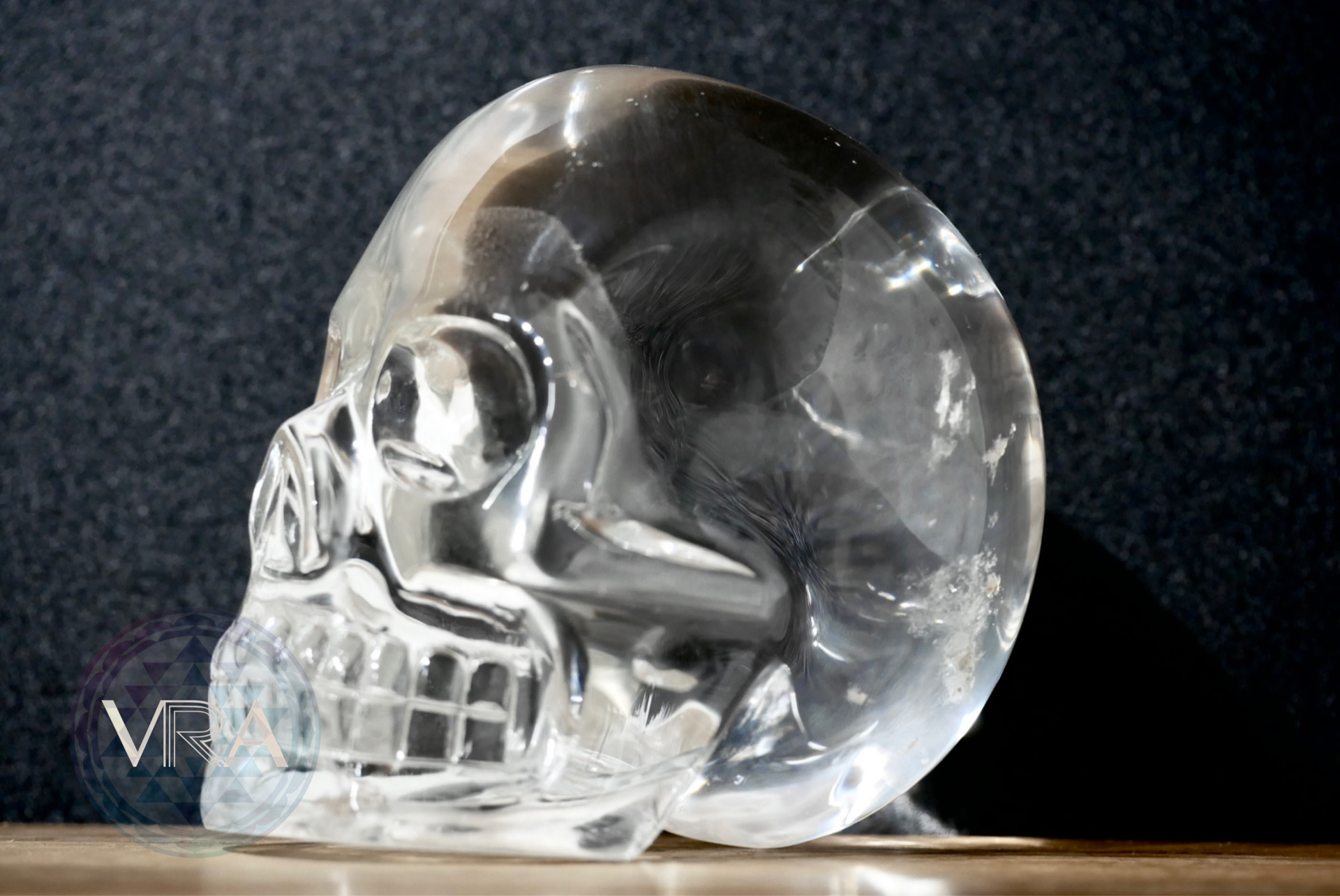 Optical Clear Quartz w Blue Hue Humanoid Skull 1020